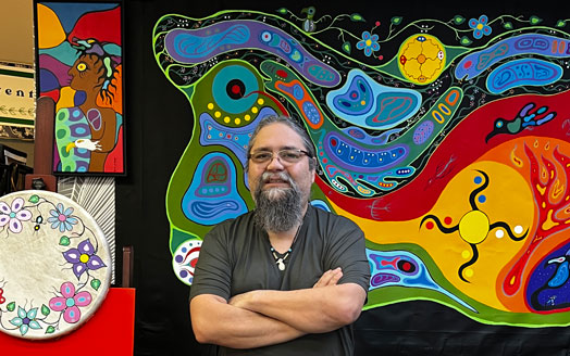 artist with paintings